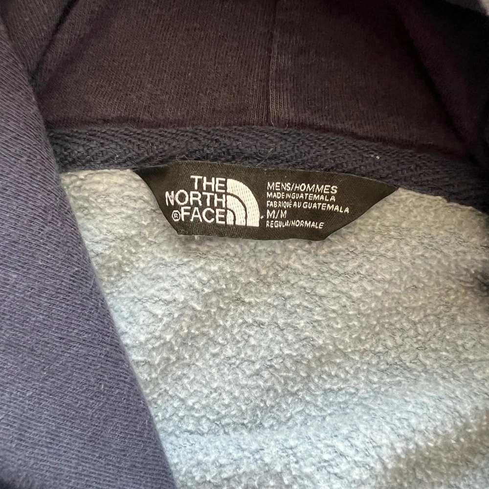 The North Face Blue Sweater with Iconic Branding